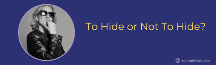 ID: B/W photo: white woman wearing sunglasses and a leather jacket. One hand rests on her chin. Words: To Hide or Not To Hide? (Photo by Molly Zacher)