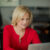 Ruth Rathblott sitting at a laptop. Photo: Maggie Marguerite Studio.